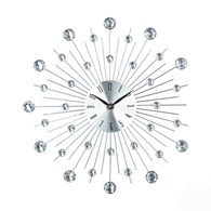 Zegar ścienny Crystals Silver 33 cmWykonany z metalu, ozdobiony połyskującymi kryształami, idealny do wnętrz urządzonych w stylu nowoczesnym i glamour