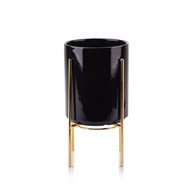 Doniczka na stojaku Neva czarna 23,5 cm Wykonana z ceramiki, metalowy stojak w kolorze złotym, idealna dekoracja każdego wnętrza czy tarasu