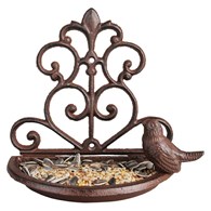 Poidełko dla ptaków ścienne żeliwneOzdobna, ażurowa dekoracja ścienna pełniąca funkcję poidła czy też karmika dla ptaszków wykonana z żeliwa o wymiarach: 18,4x18,3x10,3 cm
